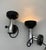 This pair of wall lamps, attributed to Stilnovo, is adjustable. Typical 1970s spotlights. The material is sheet metal,...