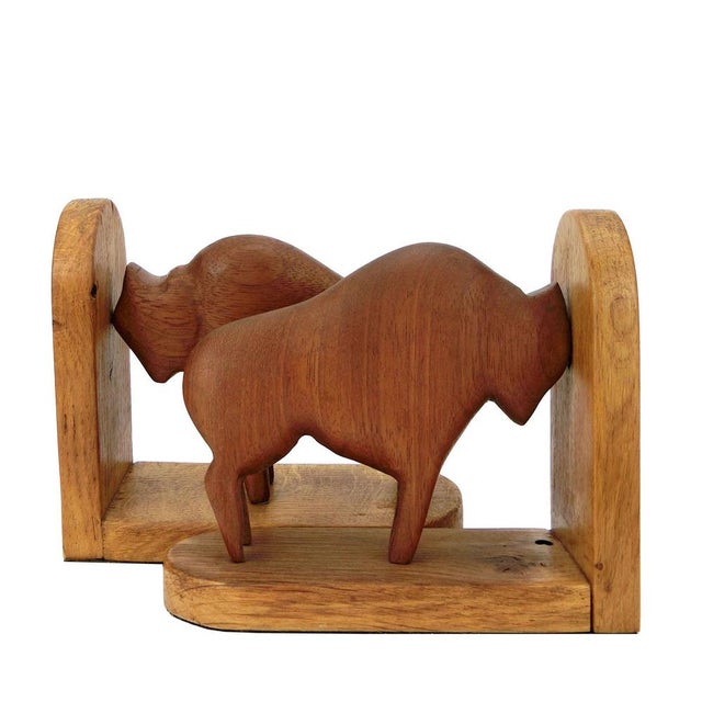 2 original vintage bookends from the 1960s made of wood - teak & oak, with two carved buffaloes, in an extraordinary...
