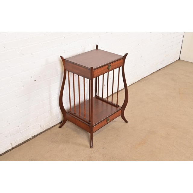An exceptional French Regency Louis XVI style nightstand or occasional side table By Maslow Freen USA, Circa 1940s Carved...