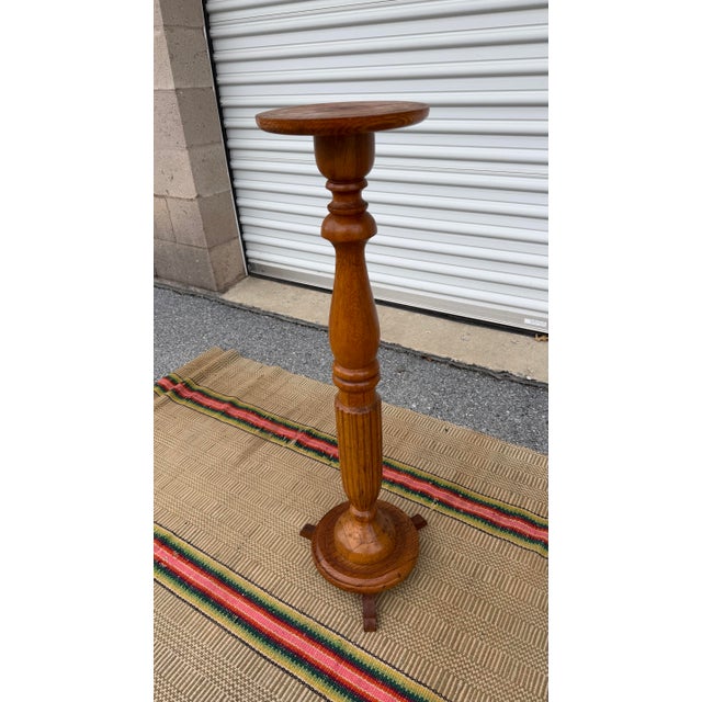 A Vintage Antique Turned Oak Pedestal, Circa 1890’s Made in the USA, circa 1890-1910 Made from turned and reeded oak wood,...