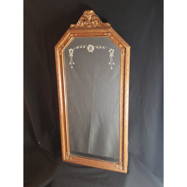 Where do we start with this a stunning beauty? This mirror dates back at least to the 1920's if not slightly older. The...