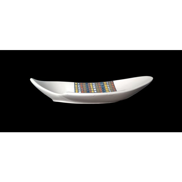 Roger Capron (1922-2006) in Vallauris, large free-form bowl with polychrome checkerboard decoration. This piece has an...