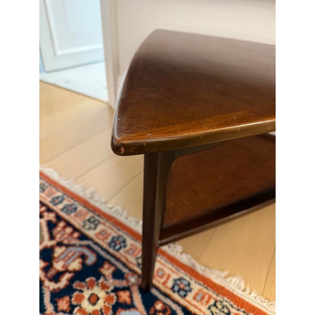 Walnut triangle coffee table with rattan bottom