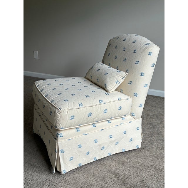 Elegant and timeless Baker Furniture slipper lounge chair from the Milling Road collection, featuring a tailored ivory...