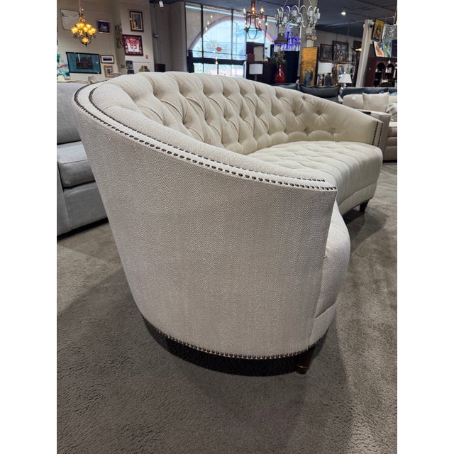 A graceful reinterpretation of a timeless silhouette, this Schnadig “Classic Elegance” Chesterfield sofa exudes refined...