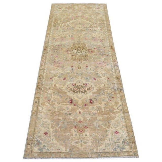 Hand-knotted with care using traditional rug-making techniques, this wool rug blends timeless craftsmanship with a modern...