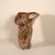 Large sculptural studio pottery vessel featuring an expressive hand-formed silhouette with dramatic twisting contours and...