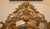 19th Century French Louis XV Style Carved and Giltwood Beveled Mirror Dimensions : 50" Tall X 36" Wide This stunning...
