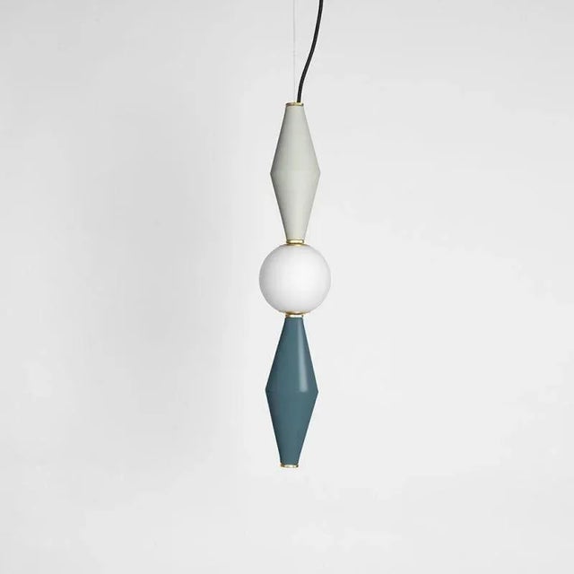 Pair of Gamma D lamp by Mason Editions Dimensions: 12 × 12 × 37 cm Materials: aluminum and blown opal white glass Colours:...
