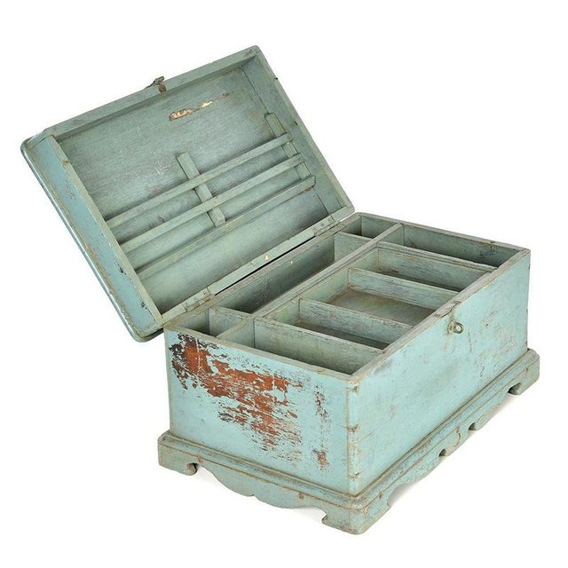 This compartmentalized box, made entirely of antique patinated wood, seduces with its rustic charm and preserved...