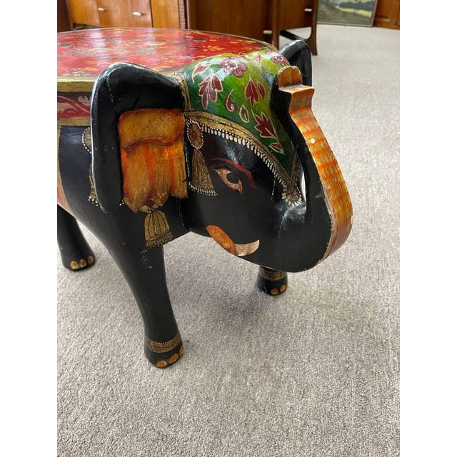 Up for sale is a vintage handcarved and handpainted wooden elephant footstool. Im not sure of the age on this piece and it...