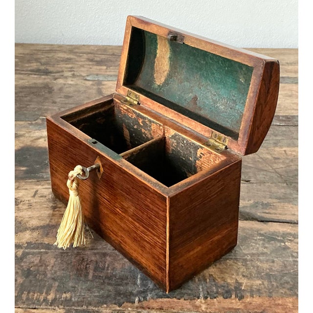 This charming vintage treasure trunk showcases the timeless artistry of marquetry. Crafted from richly grained wood with...