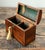 This charming vintage treasure trunk showcases the timeless artistry of marquetry. Crafted from richly grained wood with...