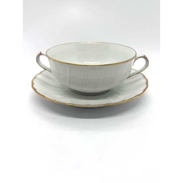 Cream soup and saucer sets by the Bernardaud in the Verlaine pattern. Original from 1980s and in great used condition....