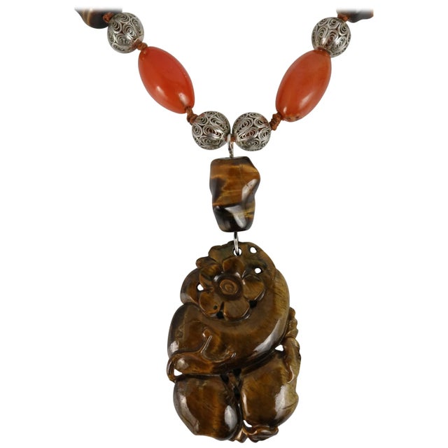 This is part of Chairish’s Fine Jewelry assortment. A Vintage Masterful Intricately Carved Large Lustrous Finest Tiger Eye...