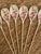 Charming vintage set of six floral demitasse or espresso spoons, each decorated with delicate pink blossoms and foliage...