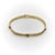 This beautiful 14k gold herringbone bracelet features three bezel set diamonds with a combined total carat weight of...