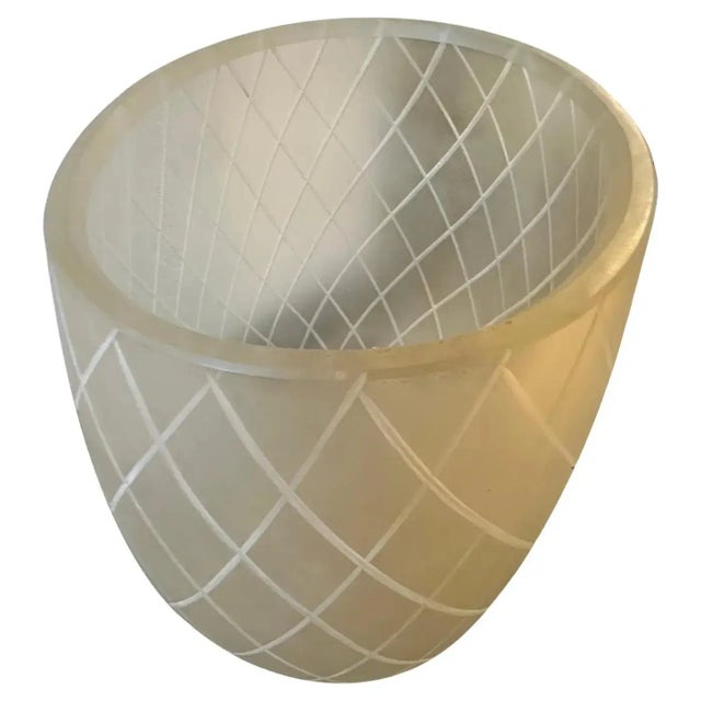 A vase designed and manufactured in Murano in the Fifties in the manner of Barovier, gold inside the satin glass creates a...