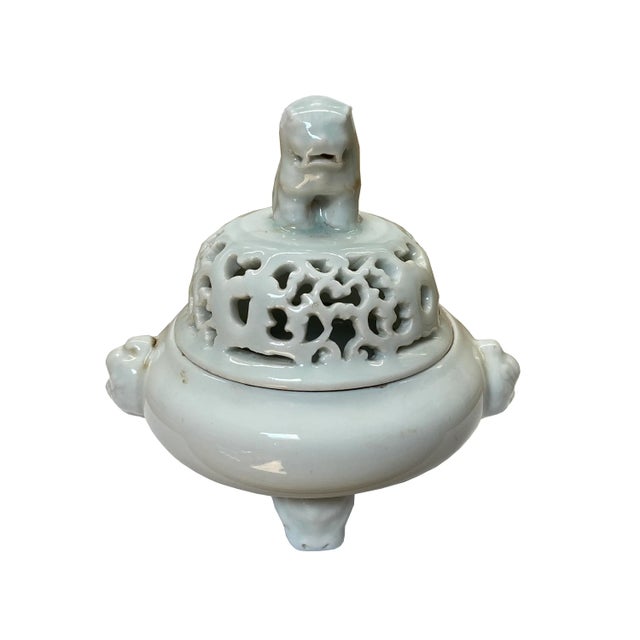 This is a handmade Chinese accent decorative ding shape incense burner or display made of light celadon color ceramic....