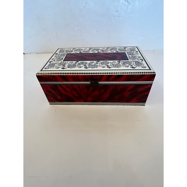 “Red Tortoise” is a one of a kind hand painted box created by Princeton artist Karen Guarriello, who learned her mastery...