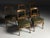 Set of 5 dining chairs Originally from France, early 20th century. The seats are upholstered in green leather. All five...