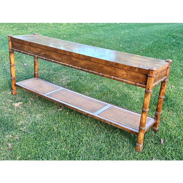 This is a really nice faux bamboo console by Drexel Heritage Furniture from the 1970s. It 's a quality solid wood piece...