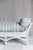 The Mallory Antique White Wicker Daybed invites you to kick back in style with its big, fluffy cushion wrapped in cheerful...