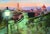 Dusking by Pam Ingalls | Oil on Board Cityscape at dusk with a lantern and Florence's skyline. For Sale