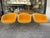 Set of 6 fiberglass armchairs upholstered in orange fabric, with chrome Lafonda bases, designed by Charles & Ray Eames and...