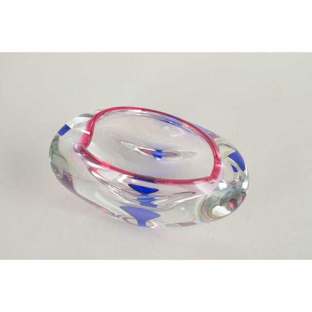 Murano, sommerso glass bowl. Organic-shaped bowl in mouth-blown art glass using the layered sommerso technique. Clear...