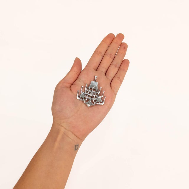 A fine signed vintage Norwegian Modernist silver brooch or pendant. Designed by Bjørn Sigurd Østern for David Andersen. In...
