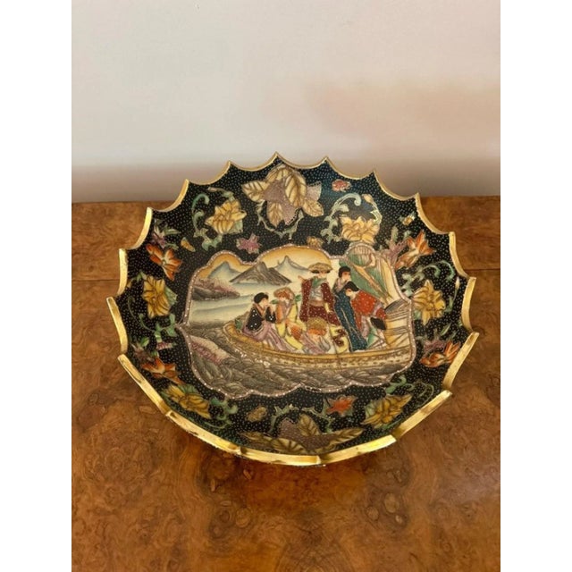 Unusual quality large antique Japanese satsuma bowl, having a quality antique Japanese satsuma pedestal bowl with an...