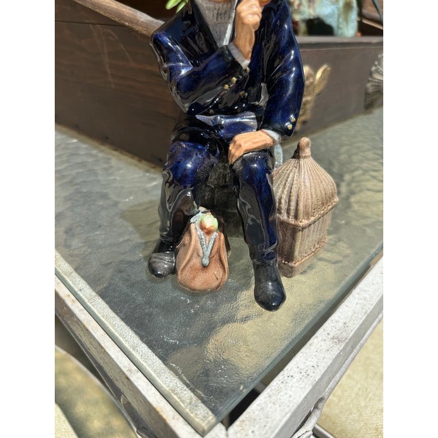 Up for consideration is a beautiful ceramic painted sculpture of a man and birds. This would look lovely in your home and...