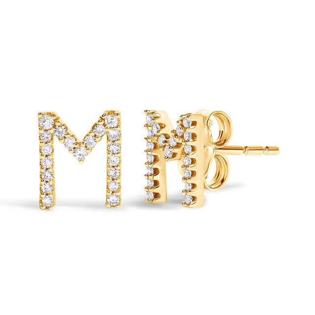 Expertly crafted to symbolize individuality and grace, this exquisite "M" initial stud earring is fashioned from radiant...