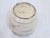 This antique rustic Chinese storage vessel is hand thrown and has a simple brushed design.