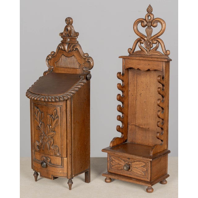 A set of two French Provencal decorative boxes including a porte-couteaux, or knife rack, and a boite à sel, or salt box....
