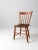 An antique farmhouse chair with a timeless primitive character. This dining or side chair features a solid plank seat and...