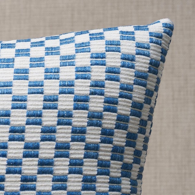 This pillow features Elkhart with a knife edge finish. Elkhart is a soft, artisanal small woven check with a wonderfully...