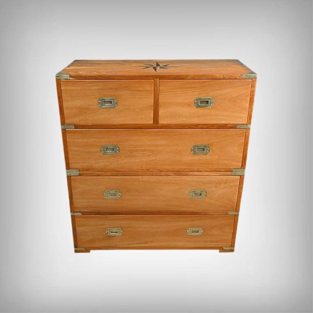 This teak chest of drawers, reminiscent of Indian colonial homes, exudes a warm and sophisticated presence, enhanced by...