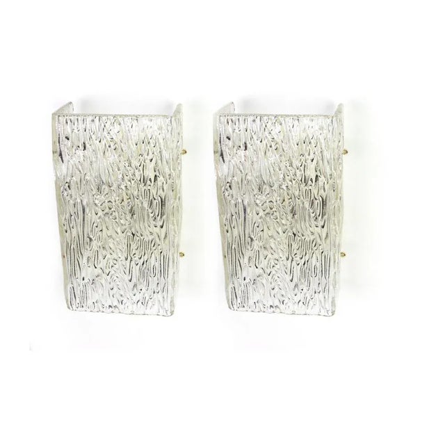 Wonderful pair of mid-century wall sconces with large murano glass piece on a frame in each wall lamp, made by kalmar,...