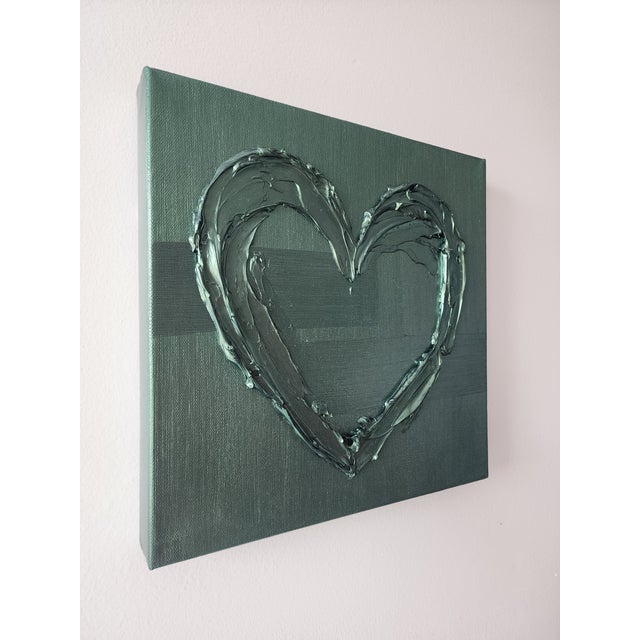 12"X12" heart painting in metallic green.