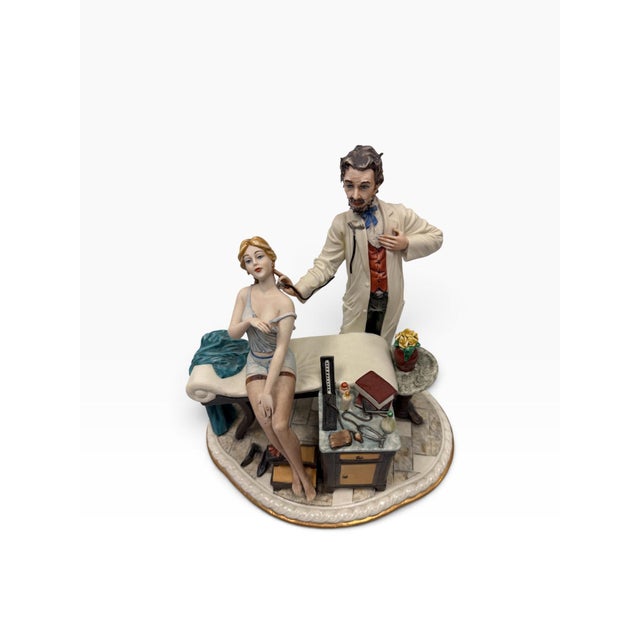 Elevate your collection with this captivating, authentic Capodimonte porcelain figure group titled "L'Ammalata" (The Sick...