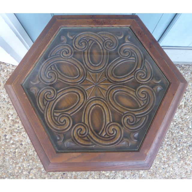 Dark brown wood hand carved.