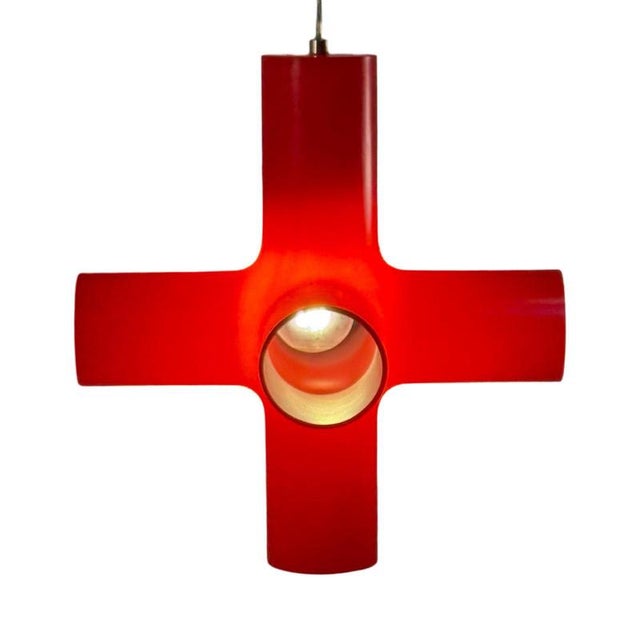Crosslight pendant lamp. The lamp has won numerous national and international awards for its daring and easily...
