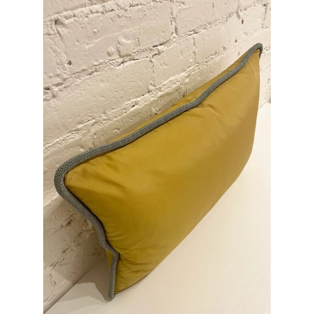 Custom-made lumbar pillow with hidden zipper. Main Fabric - Fabricut, Topaz in colorway Acid. Contrast Welt - Fabricut,...