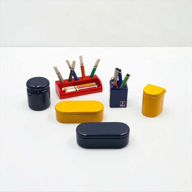 Rare set of six glazed ceramic accessories designed by pino spagnolo for sicart in italy during the 1970s. the collection...