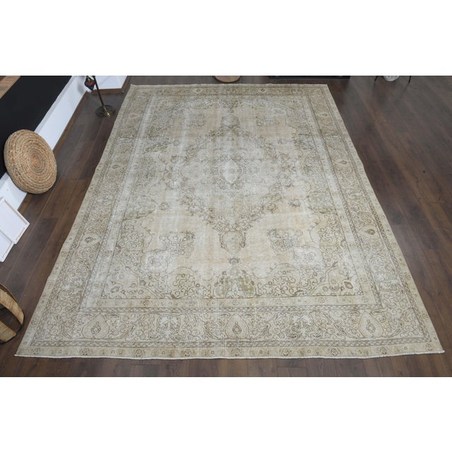 Vintage Persian Hand-Knotted area rug is a semi-antique vintage area rug. The '70s Eastern region of Anatolian's unique...