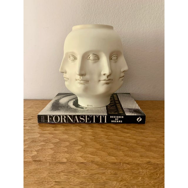 Stunning "Perpetual Face" White ceramic vase in the style of Italian artist Pietro Fornasetti. Beautiful abstract...