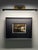 A striking original street photograph capturing the illuminated storefront of the famed Russeks department store in...