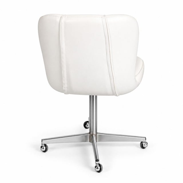 Elegant italian swivel chair designed by gastone rinaldi for rima, dating to the 1960s. the chair features a sculptural...